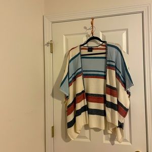 Comfortable and cute cotton poncho/jacket! Lovely southwestern colors. Size M.